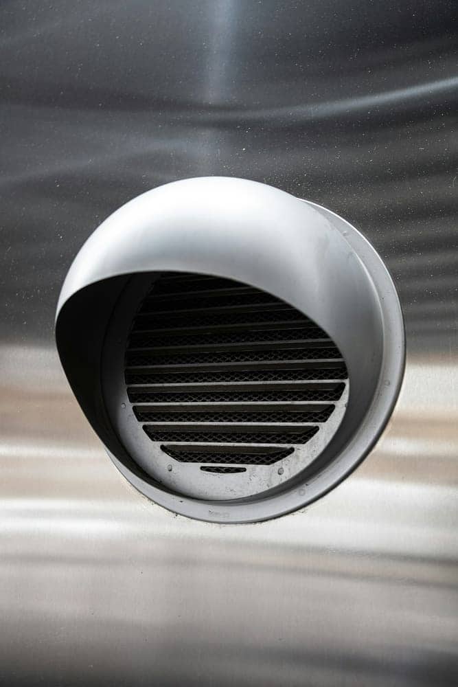 Clean round supply vent in brushed steel