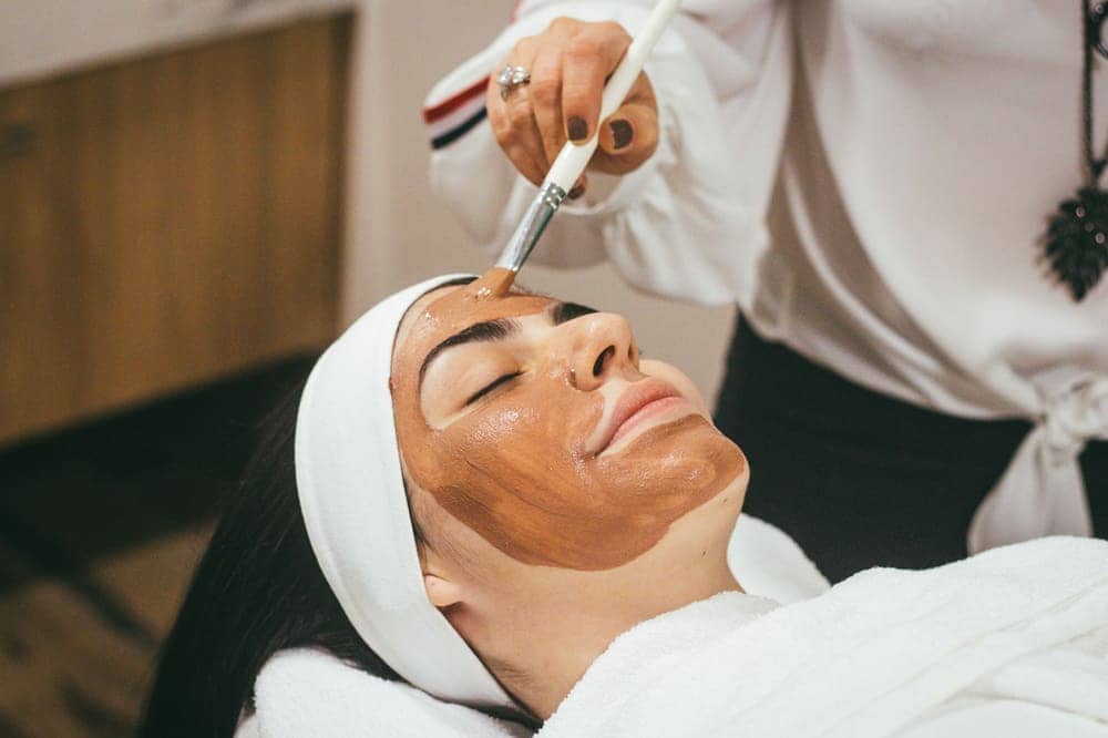 Client receiving a facial mask treatment