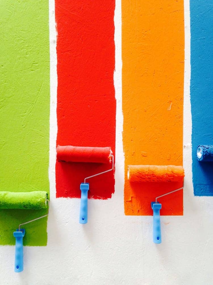 Fresh roller strokes of bright color on a prepped wall